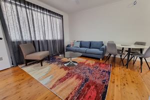 Living Room at Adamstown Short Stay Apartments.
